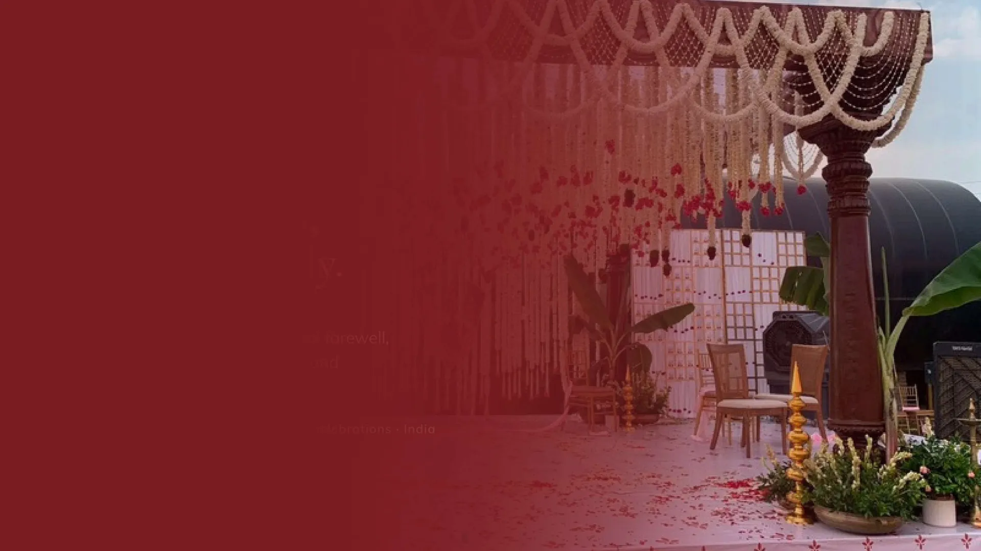 Dramatically lit wedding mandap at a venue where PlanItBetter runs chauffeur-driven guest transportation